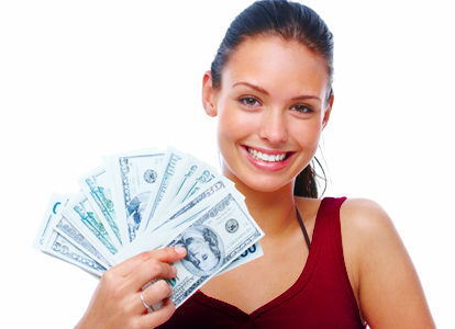 Cheerful young lady showing cash and smiling